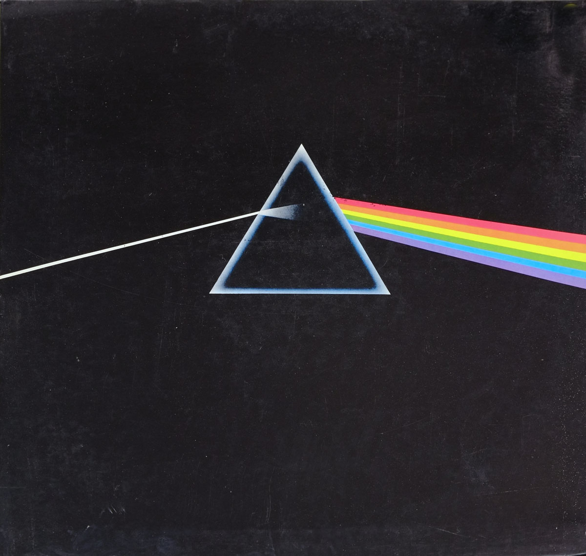 This cover, designed by the art collective Hipgnosis with input from the band, is notable for its minimalist aesthetic. There is an intentional absence of text—no band name, album title, or catalog number appears on the front, creating an enigmatic allure. This design choice focuses attention solely on the symbolic image of the prism and light, an abstraction often interpreted as representing clarity, transformation, and the complex facets of human experience.